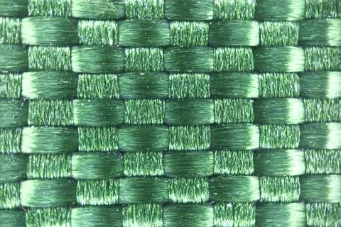 Macro texture of green fabric threads background with selective focus and copy 스톡 사진