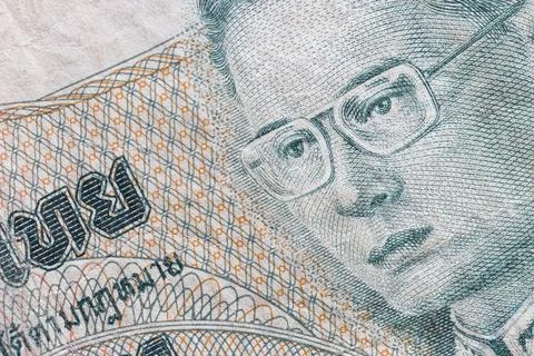 Macro texture of intricate guilloche patterns on Thai banknote Stock Photos