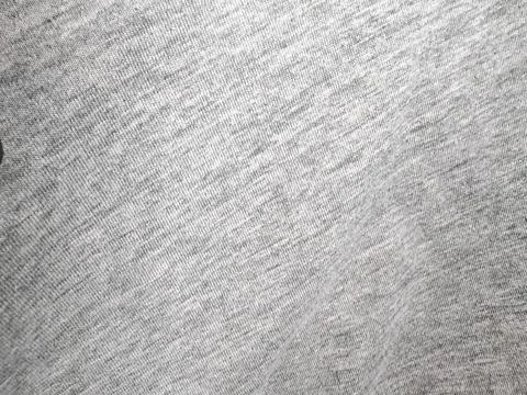 Macro Texture of Light Grey Marled Knit Fabric - Soft Heathered Textile Back Stock Photos