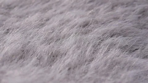 Macro texture of mink and cashmere wool fabric in light grey color rotating, Stock Footage 318004753