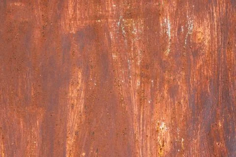 Macro texture of peeled paint on rusty iron closeup. Stock Photos