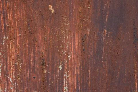 Macro texture of peeled paint on rusty iron closeup. Stock Photos