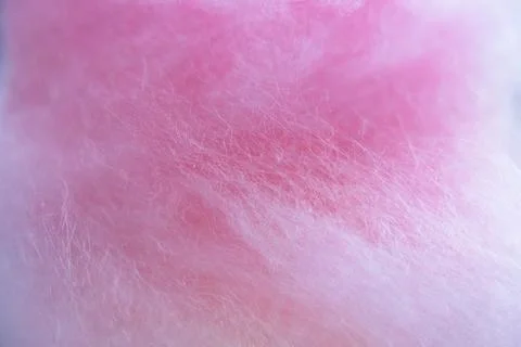 Macro texture of pink cotton candy sugar threads background close up Stock Photos
