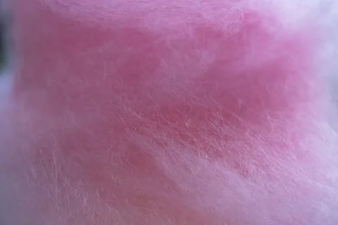 Macro texture of pink cotton candy sugar threads background close up Stock Photos