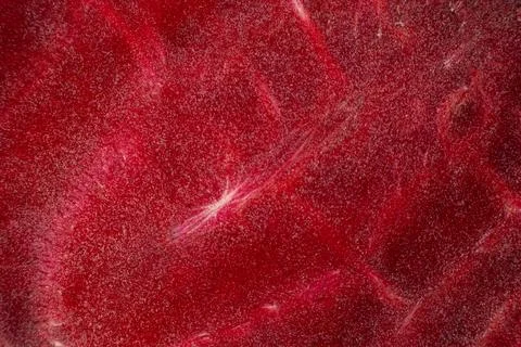 Macro Texture of Raw Red Beetroot Slice, Top View Background Foto stock