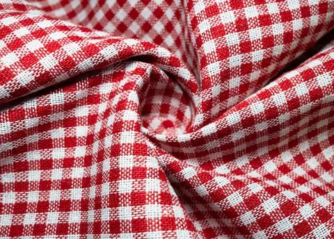 Macro texture of red and white fabric threads background with selective focus 写真素材