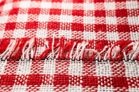 Macro texture of red and white fabric threads background with selective focus Stock Photos