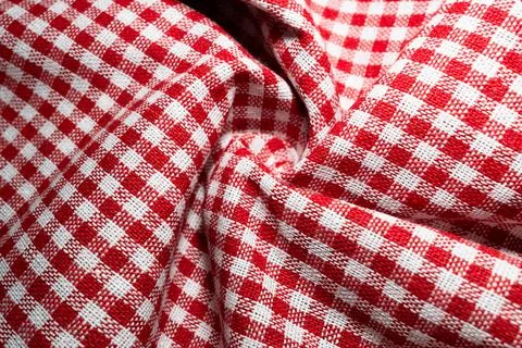 Macro texture of red and white fabric threads background with selective focus Stock Photos