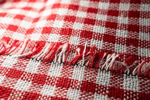Macro texture of red and white fabric threads background with selective focus Stock Photos