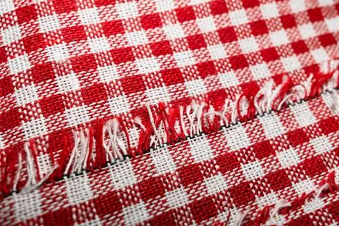 Macro texture of red and white fabric threads background with selective focus Stock Photos