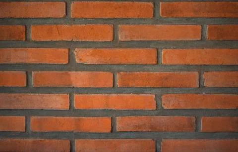 Macro texture of red old brick wall close-up Stock Photos