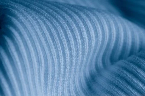 Macro Texture of Ribbed Knit Fabric. Cloud Dancer 11-4201. Stock Photos
