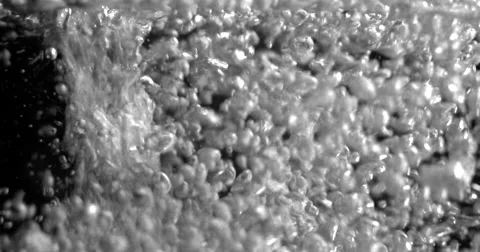 Macro texture shot of water bubbles gently floating in deep water Stock Footage 68440729