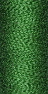 Macro texture of a skein of green sewing thread Stock Photos