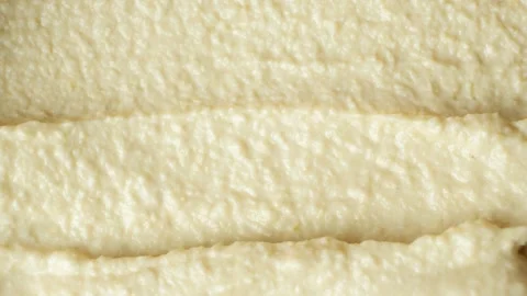 Macro texture of smooth creamy hummus top view Stock Footage 333131155