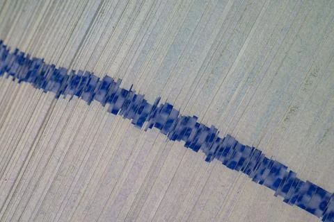 Macro texture of a stack of new banknotes with blue security holographic ri.. Stock Photos