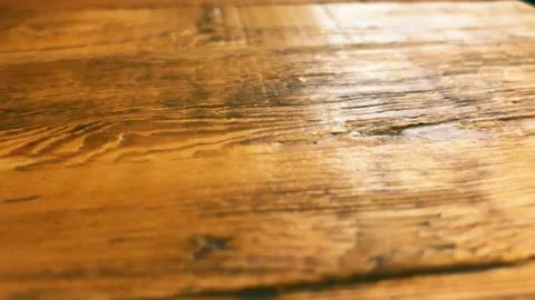 Macro texture of treated hardwood table surface in cafe interior Stock Photos