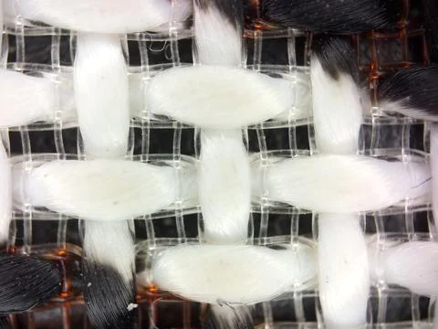 Macro texture of white fabric threads, close up background with selective focus Stock Photos