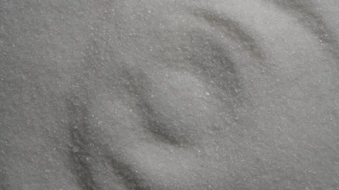 Macro texture of white granulated sugar background with wave pattern, rotate Stock Footage 347818503