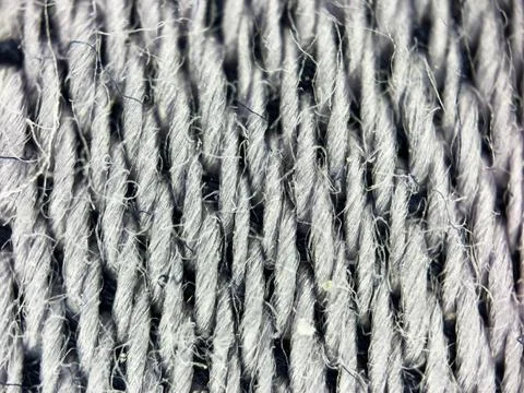 Macro texture of white or gray woven fabric threads background with selective Stock Photos