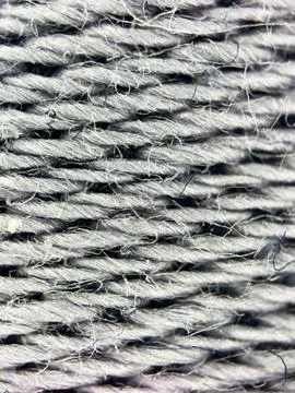 Macro texture of white or gray woven fabric threads background with selective Stock Photos
