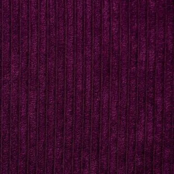 Macro texture of wool knitted fabric in purple color for a background Stock Photos
