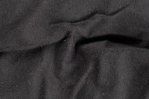 Macro Texture of Worn Blue Cotton Elastane Fabric Vintage Background 스톡 사진