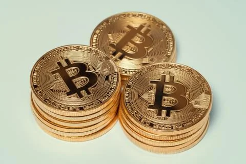 Macro three bitcoin stacks. virtual cryptocurrency concept Stock Photos