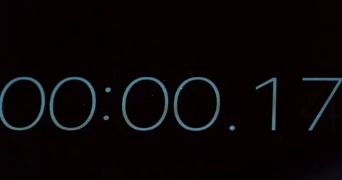 Macro of the timer counting seconds from 0 to 26 on the black screen. Close up. Stock Footage 86463131