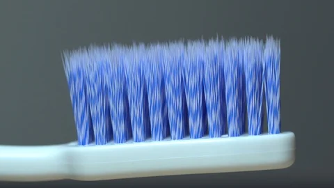 Macro toothbrush light sweep isolated Stock Footage 119079335
