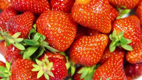 Macro Top View of Heap of Fresh Tasty Ripe Strawberries Rotates Stock-Footage 131460311