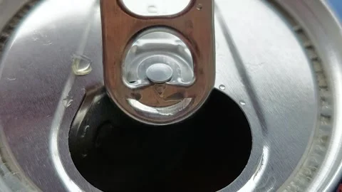 Macro top view of opening an aluminum beverage can Stock Footage 336004876