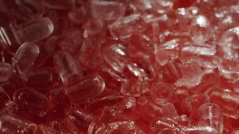 Macro top view raspberry cocktail with ice cubes in slow motion fly up Video stock 117407254