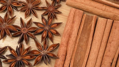 Macro Top View Of Star Anise And Cinnamon Spices On Wood Видео 331379230