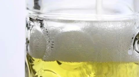 Macro topping up a beer Stock Footage