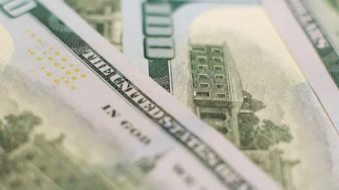 Macro tracking shot of 100 dollar bills background Video stock 128354373