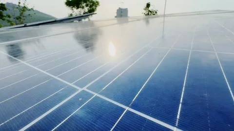 Macro Tracking Shot Across Solar Panel Cells With Sunlight Reflection and Stock Footage 340821568