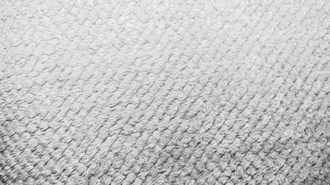 Macro tracking shot reveals soft white cotton towel fabric texture with organic  스톡 동영상 336382142