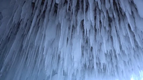 Macro transparent ice formations winter cave crystal clear stalactites, icicles  Video stock 317963479