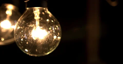 Macro of two light bulbs old fashioned Stock Footage 98357486