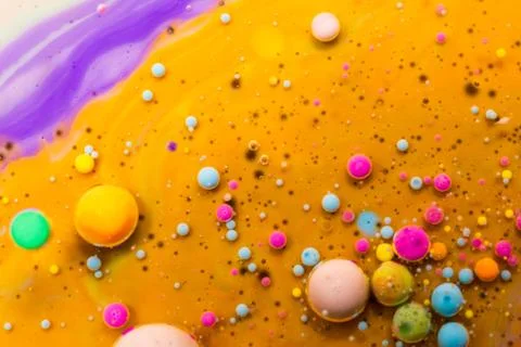 Macro universe, platnets and stars in it, multi-colored paints. Stock Photos