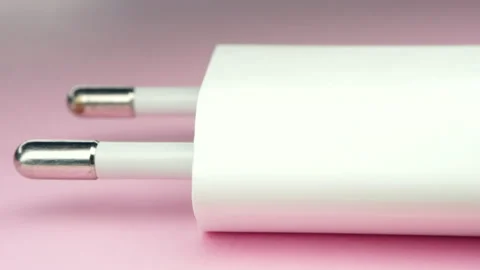 Macro USB adapter.Camera Slides Along USB adapter USB adapter on pink background Stock Footage 155280536