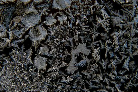 Macro of various abstract shapes of ice crystals Stock Photos