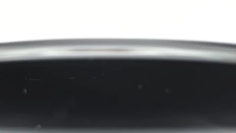 Macro video of air bubbles in water on a black background. Stock Footage 297083054