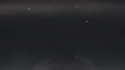 Macro video of air bubbles in water on a black background. Stock Footage 297083368