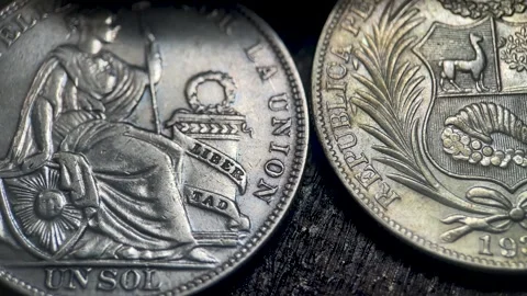 Macro Video of Antique Peruvian Un Sol Silver Coin Details Video stock 334056104