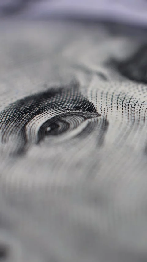 Macro video. Close-up of US 100 dollar bill. Rotation of 100 dollar. Stock Footage 309616212