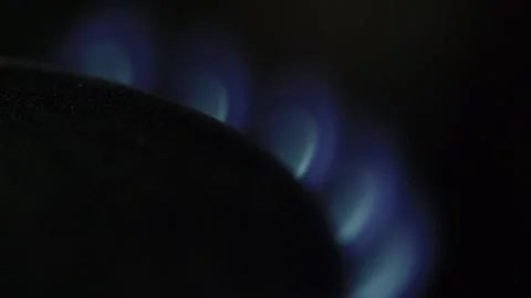 Macro video of a gas burner heating up in the dark Video stock 301666064