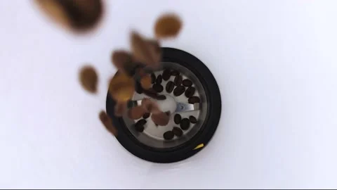 Macro video of how coffee beans are pouring onto the blade of an electric coffee Stock Footage 139805835