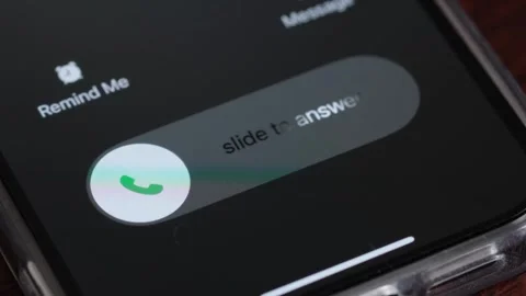 Macro video of an incoming call on a mobile phone. Pick up or reject a call on Video stock 245575241